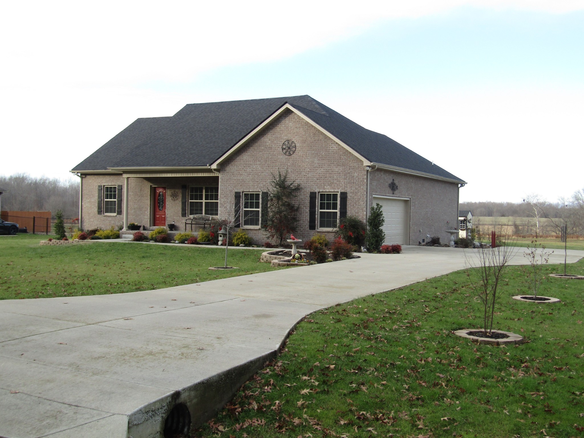 721 Elrod Road Manchester, TN 37355 - Photo 3 of 41 a front view of a house with a yard