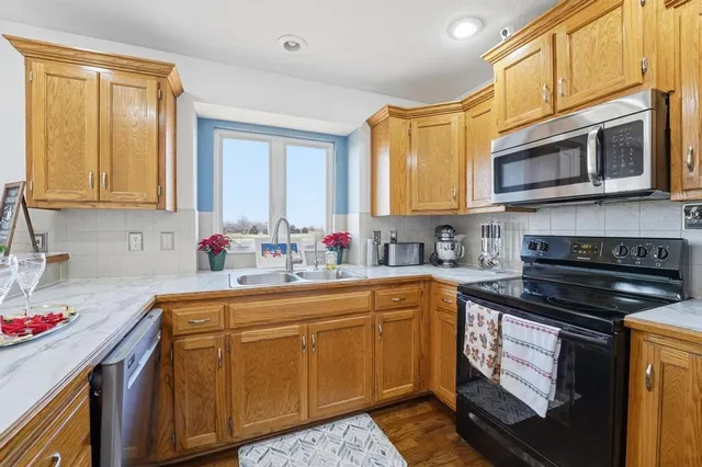 $460,000 | 9801 East Seville Circle, Peculiar, MO 64078