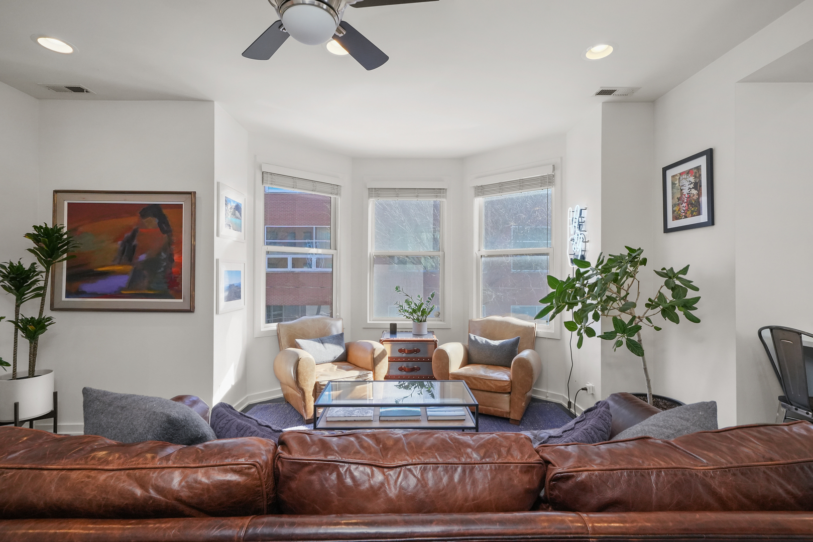 1735 West Division Street, Unit 204 Chicago, IL 60622 - Photo 11 of 26 a living room with furniture and flowers