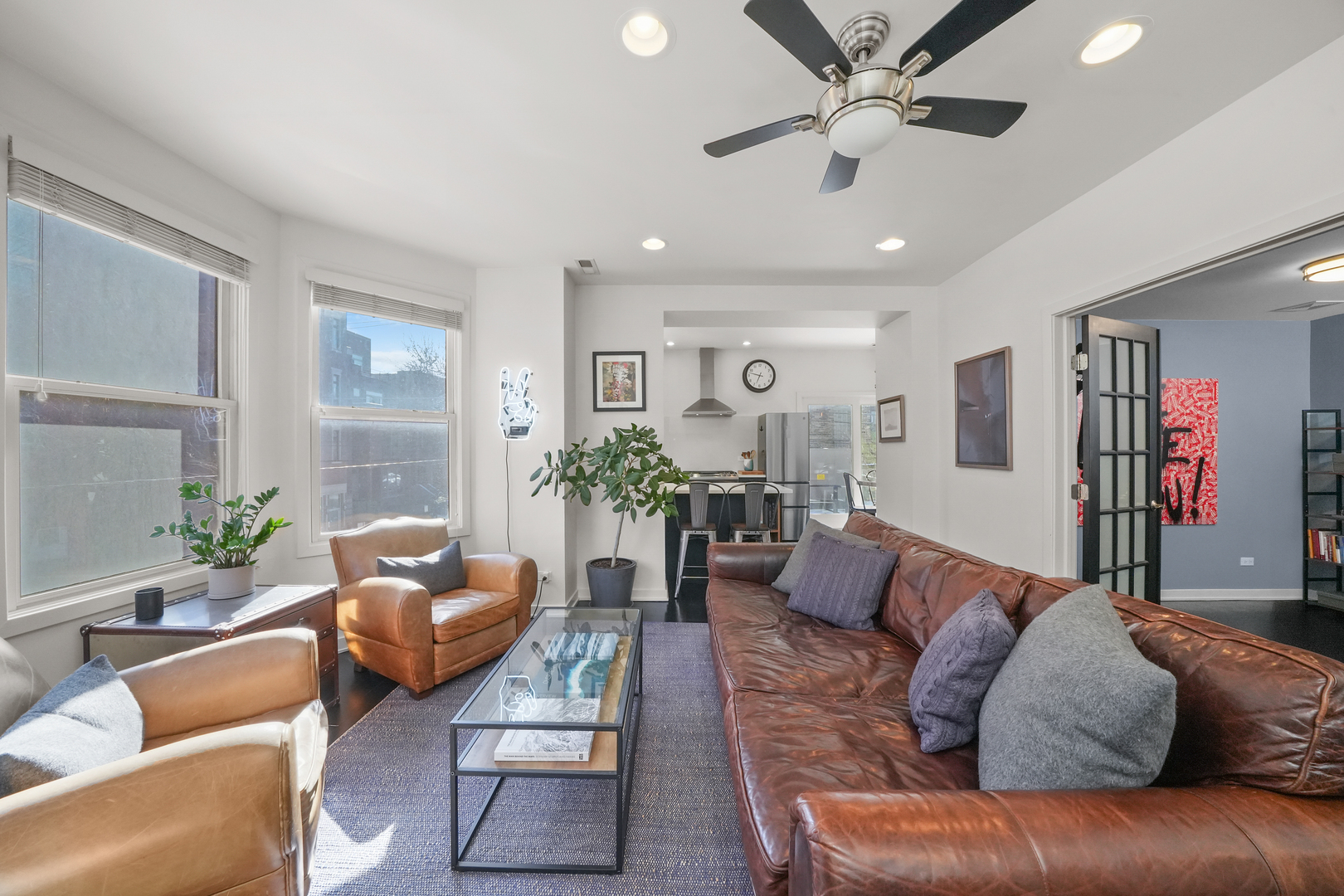 1735 West Division Street, Unit 204 Chicago, IL 60622 - Photo 12 of 26 a living room with furniture and a large window