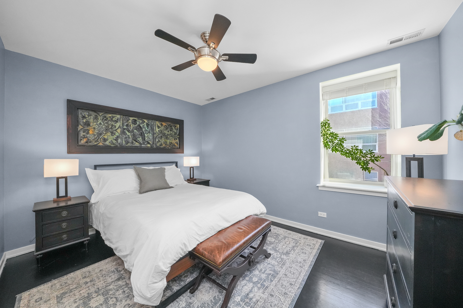 1735 West Division Street, Unit 204 Chicago, IL 60622 - Photo 15 of 26 a bedroom with a large bed and a window