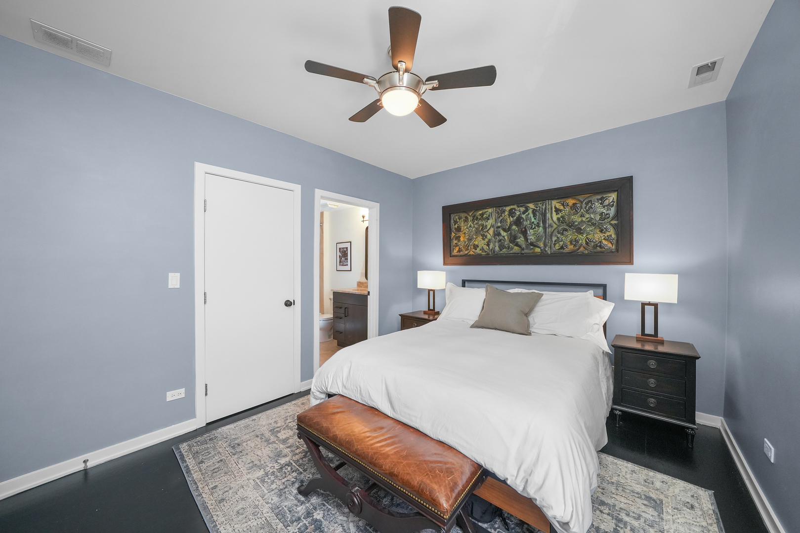 1735 West Division Street, Unit 204 Chicago, IL 60622 - Photo 16 of 26 a bed room with a bed and a chandelier