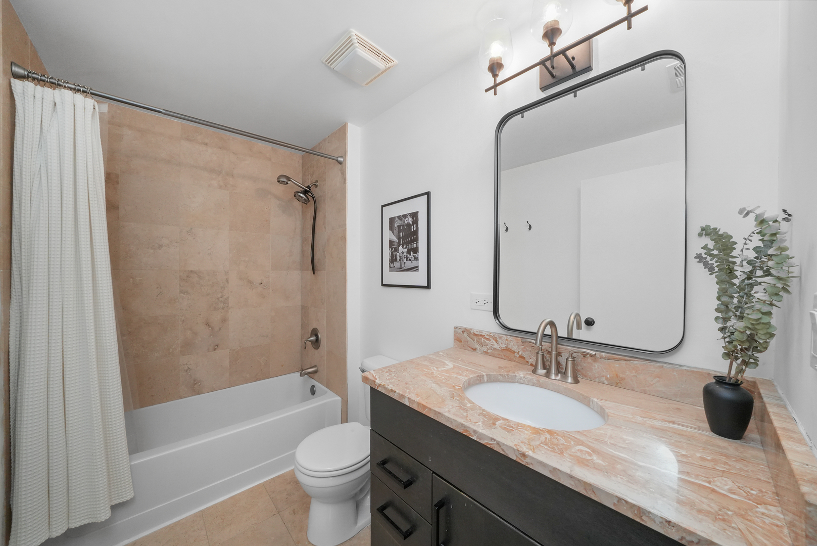 1735 West Division Street, Unit 204 Chicago, IL 60622 - Photo 17 of 26 a bathroom with a granite countertop sink toilet and shower