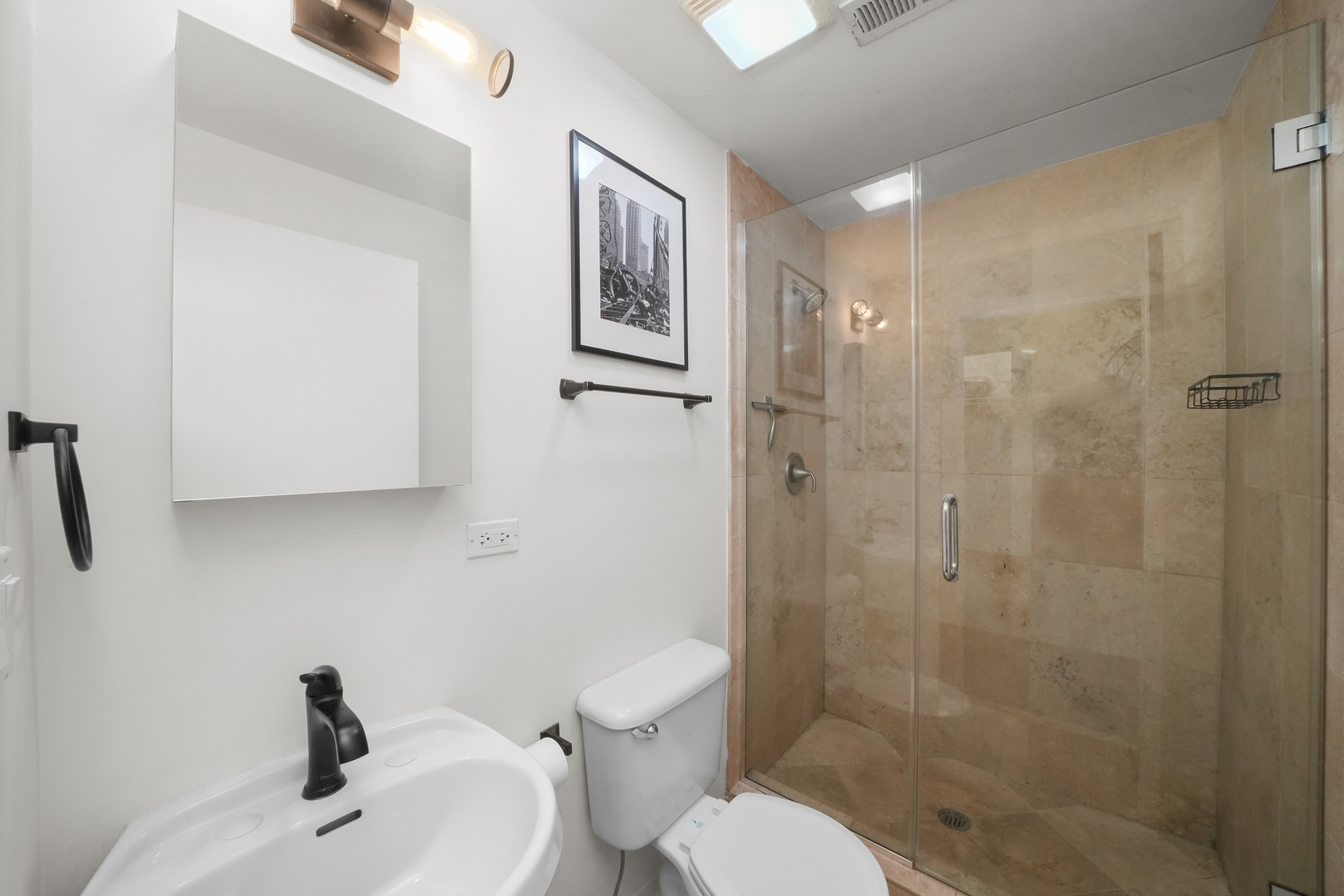 1735 West Division Street, Unit 204 Chicago, IL 60622 - Photo 20 of 26 a bathroom with a sink toilet and shower