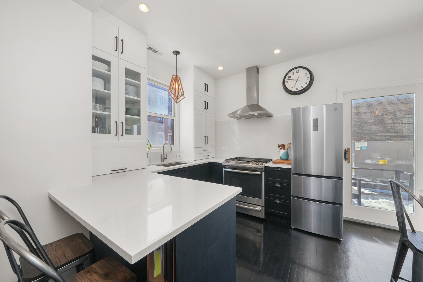 1735 West Division Street, Unit 204 Chicago, IL 60622 - Photo 2 of 26 a kitchen with stainless steel appliances a refrigerator and a stove top oven
