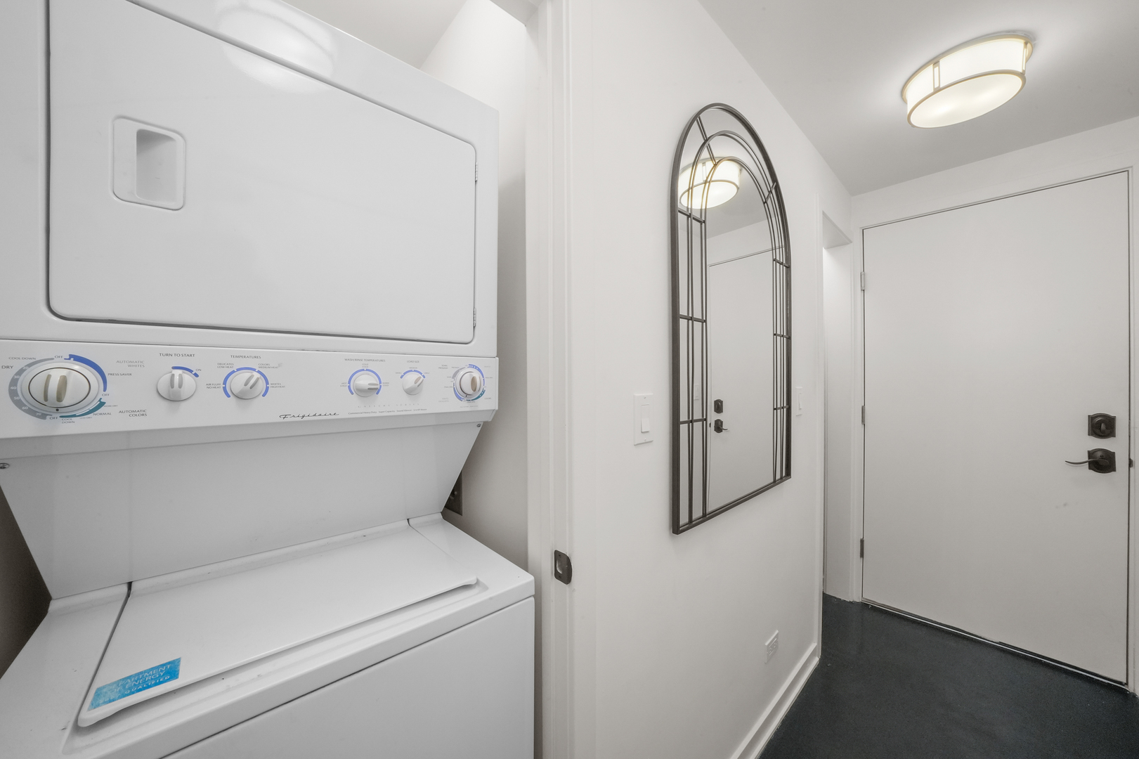 1735 West Division Street, Unit 204 Chicago, IL 60622 - Photo 22 of 26 a view of washer and dryer