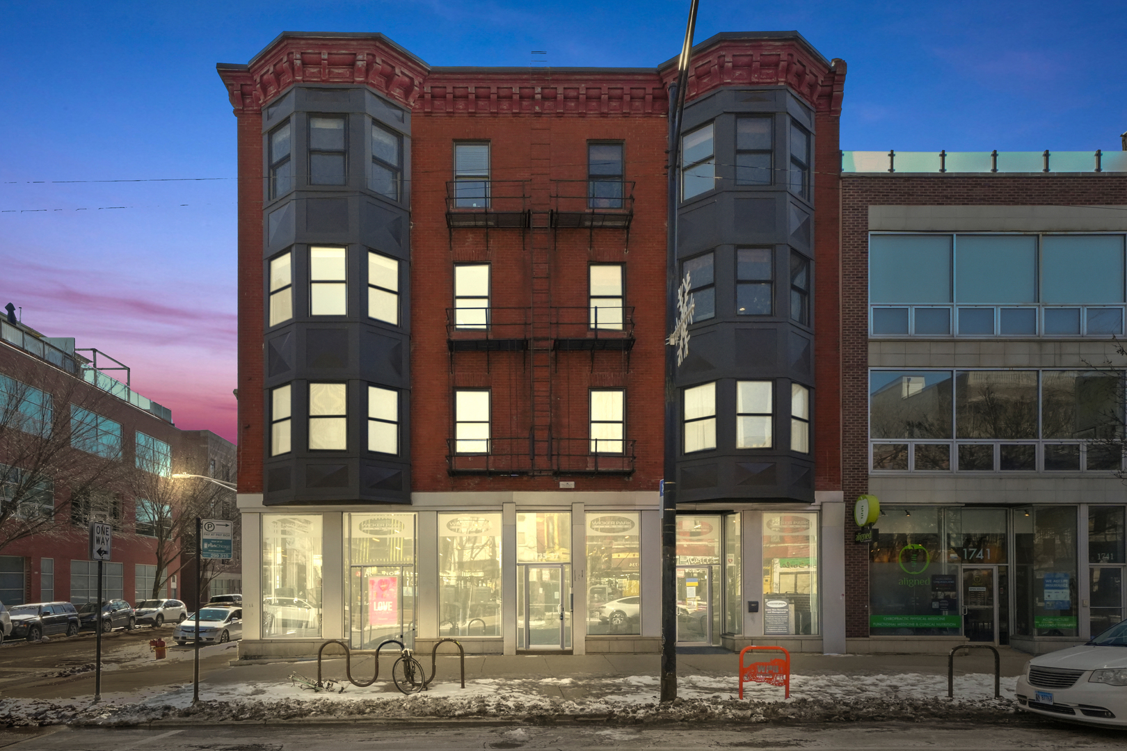 1735 West Division Street, Unit 204 Chicago, IL 60622 - Photo 25 of 26 a front view of a building with a lot of windows