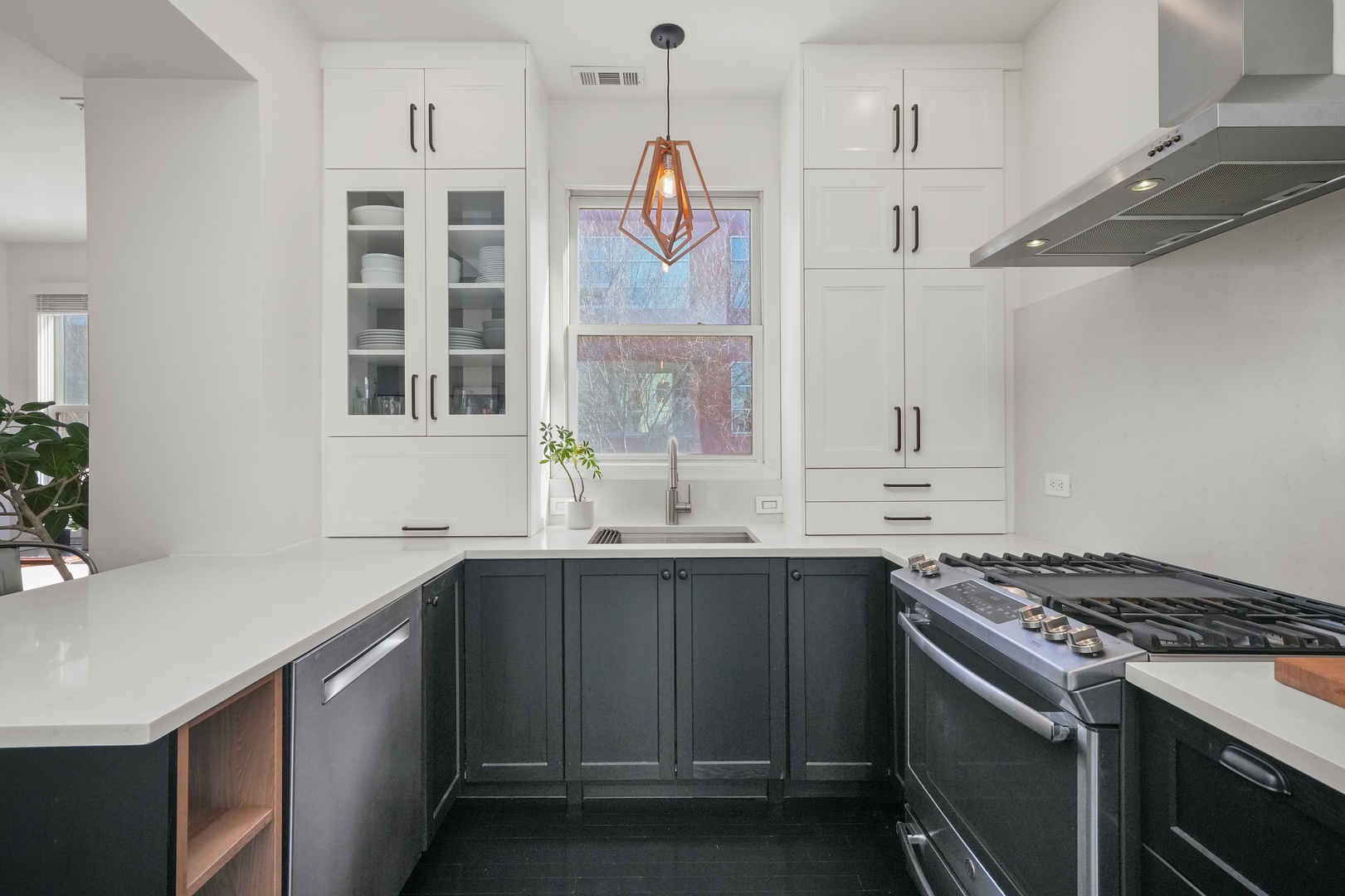 1735 West Division Street, Unit 204 Chicago, IL 60622 - Photo 4 of 26 a kitchen with stainless steel appliances a sink and a stove