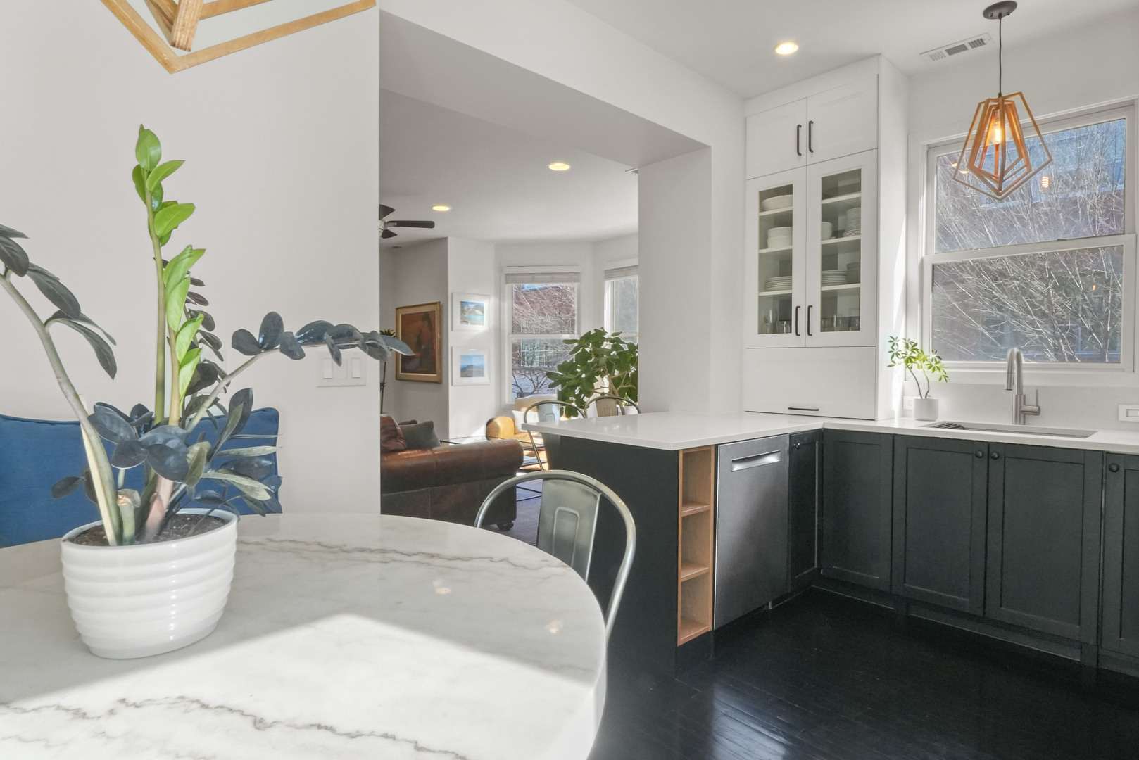 1735 West Division Street, Unit 204 Chicago, IL 60622 - Photo 8 of 26 a living room with furniture and potted plant