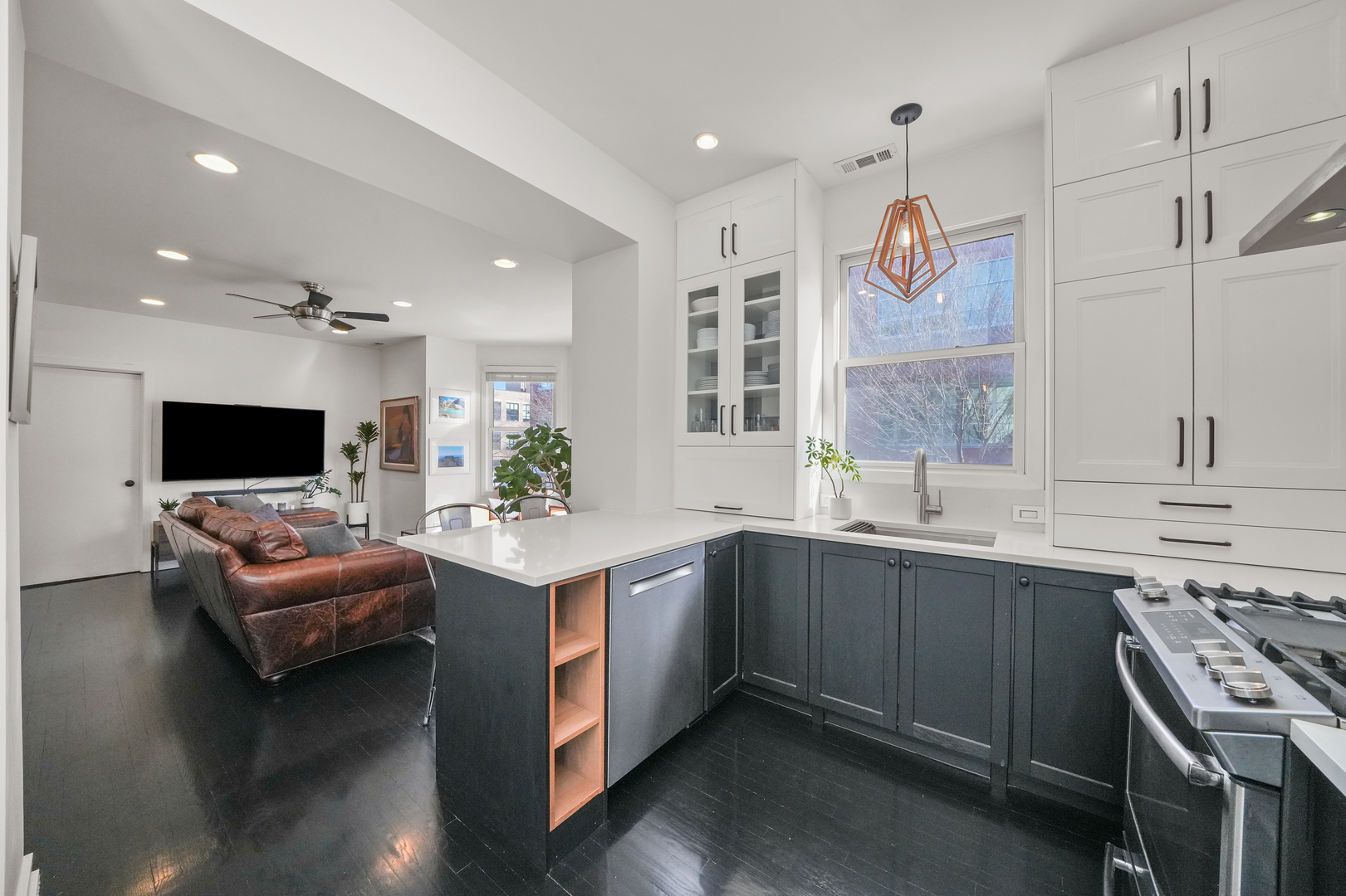 1735 West Division Street, Unit 204 Chicago, IL 60622 - Photo 9 of 26 a view of living room kitchen with a sink and dishwasher