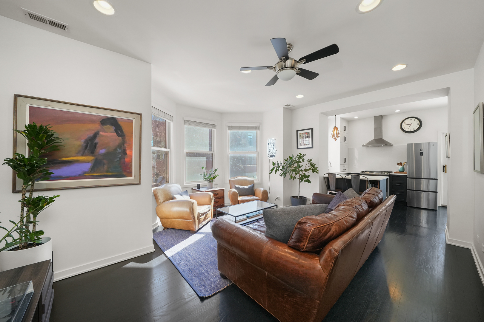 1735 West Division Street, Unit 204 Chicago, IL 60622 - Photo 10 of 26 a living room with furniture and a large window
