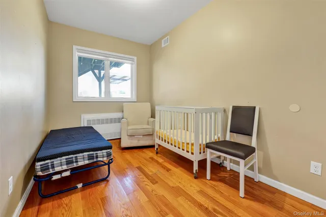 a room with furniture and wooden floor