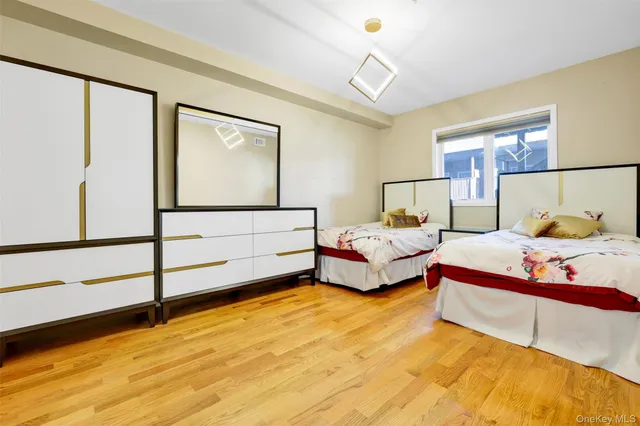 a bedroom with bed and window