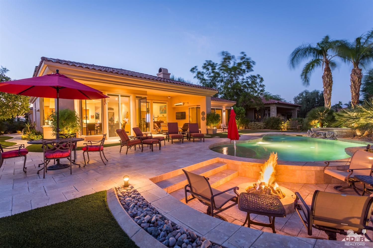 an outdoor space with patio lots of furniture