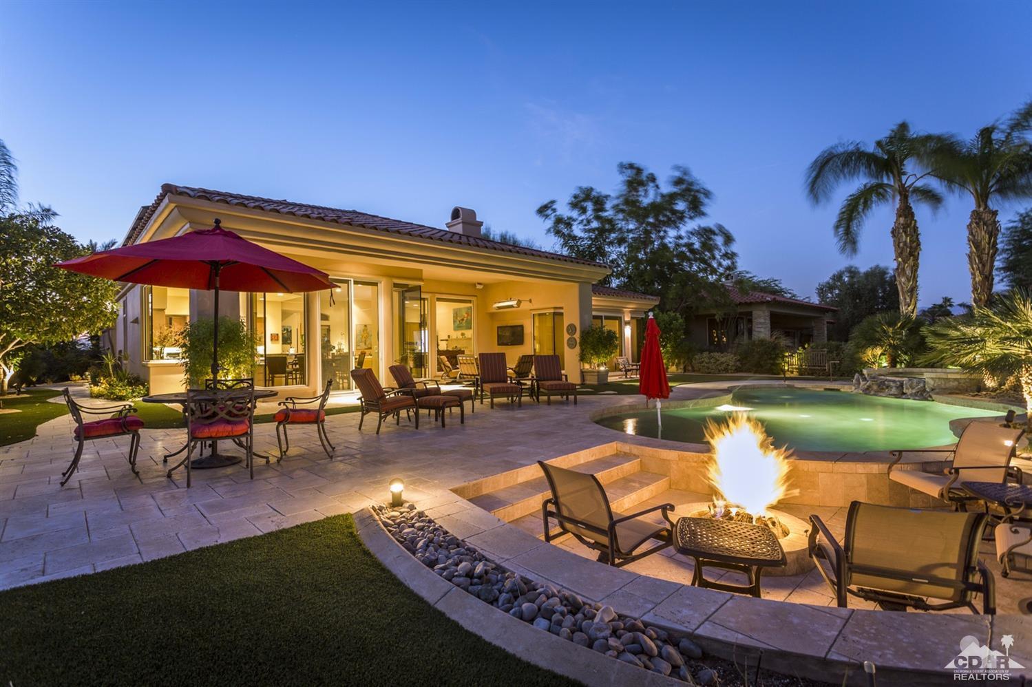 314 Loch Lomond Road Rancho Mirage, CA 92270 - Photo 12 of 48 a swimming pool with outdoor seating and yard