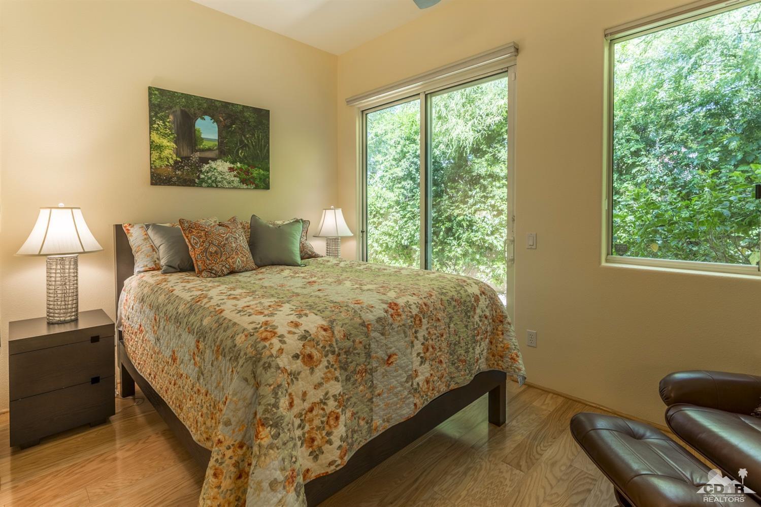 314 Loch Lomond Road Rancho Mirage, CA 92270 - Photo 17 of 48 a bed sitting in a bedroom next to a window