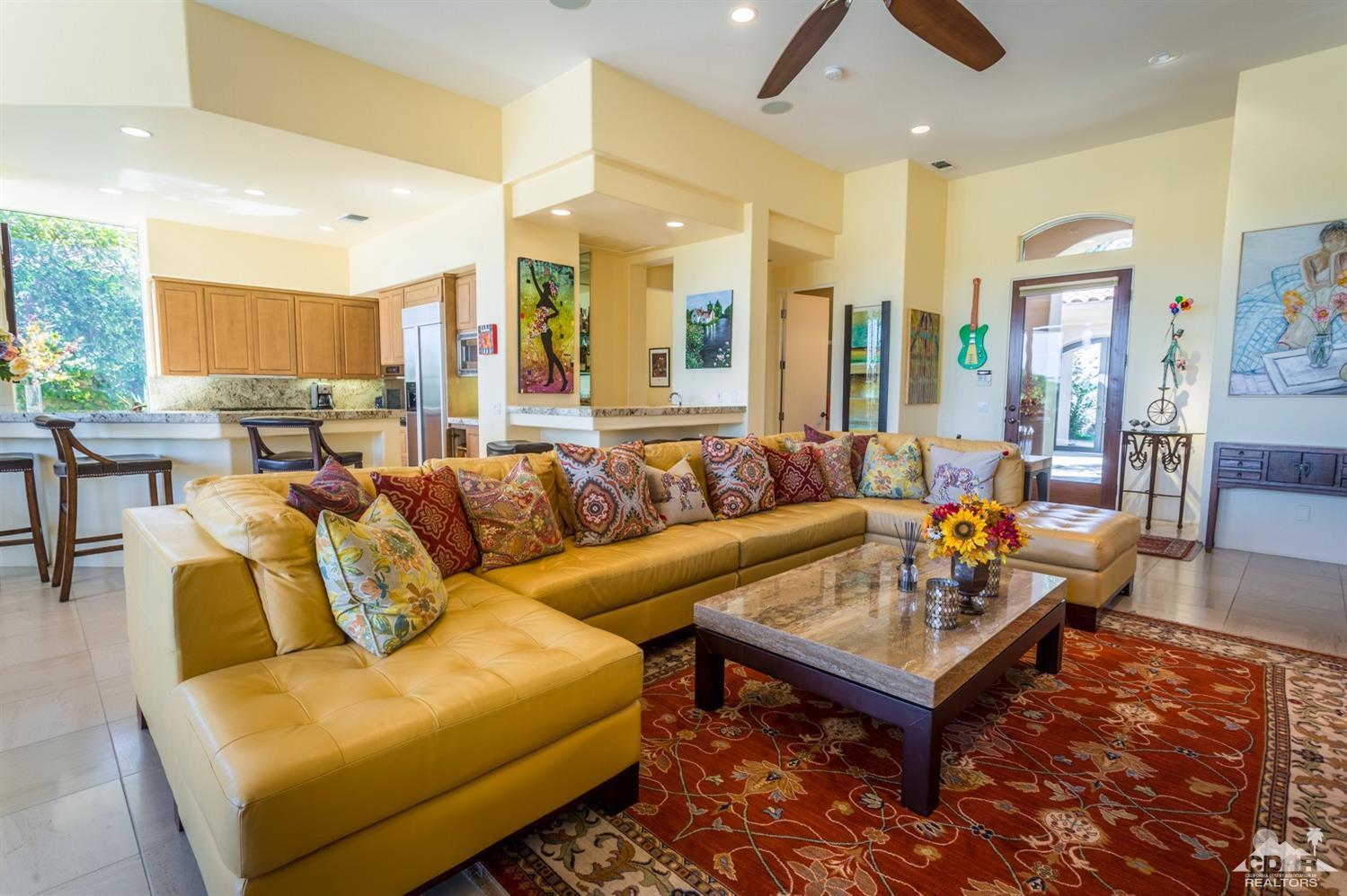 314 Loch Lomond Road Rancho Mirage, CA 92270 - Photo 24 of 48 a living room with furniture and a table