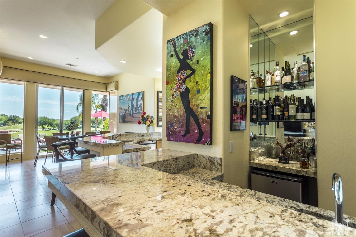 314 Loch Lomond Road Rancho Mirage, CA 92270 - Photo 25 of 48 a view of a living room and kitchen