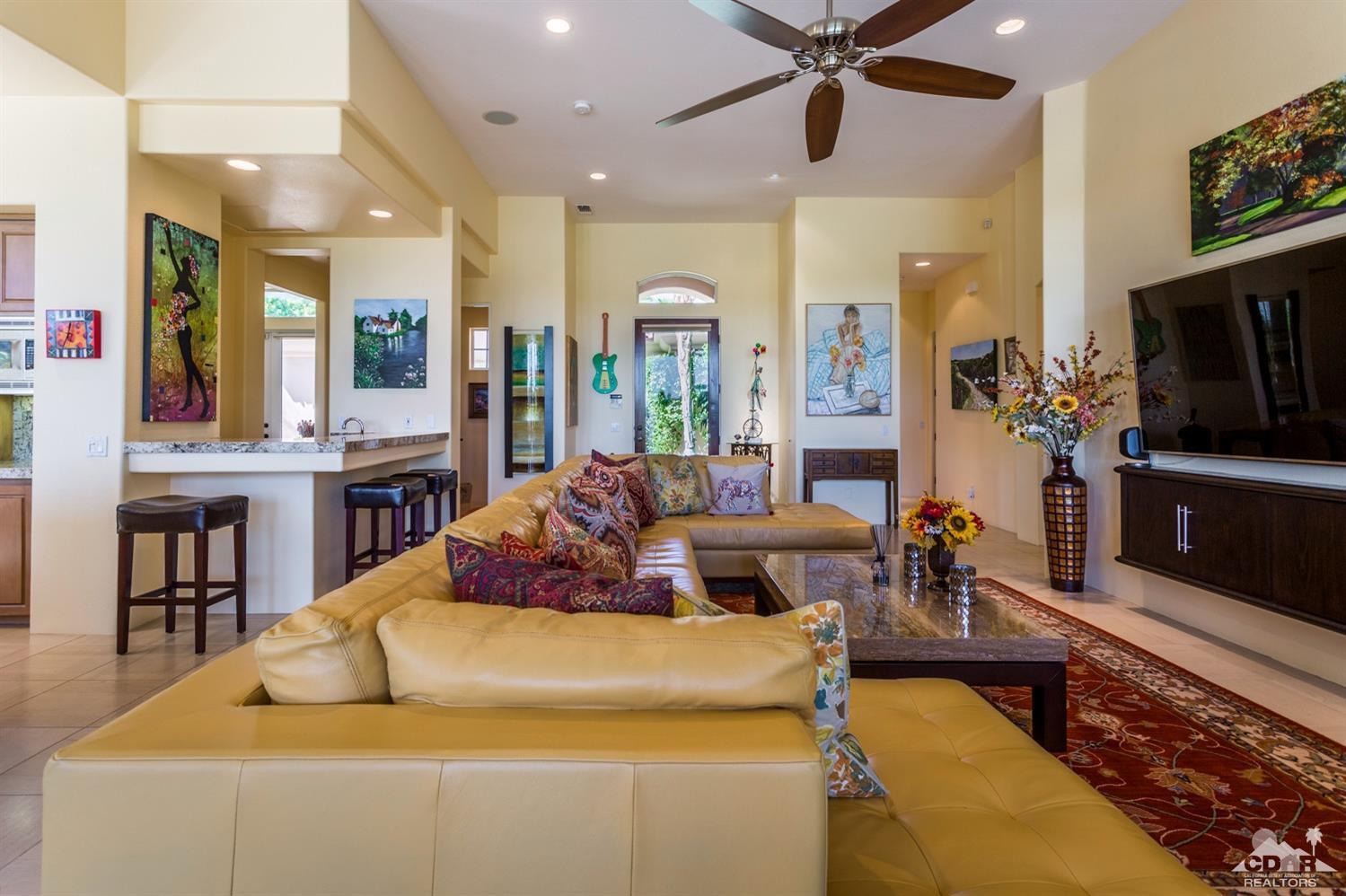 314 Loch Lomond Road Rancho Mirage, CA 92270 - Photo 29 of 48 a living room with furniture and a flat screen tv