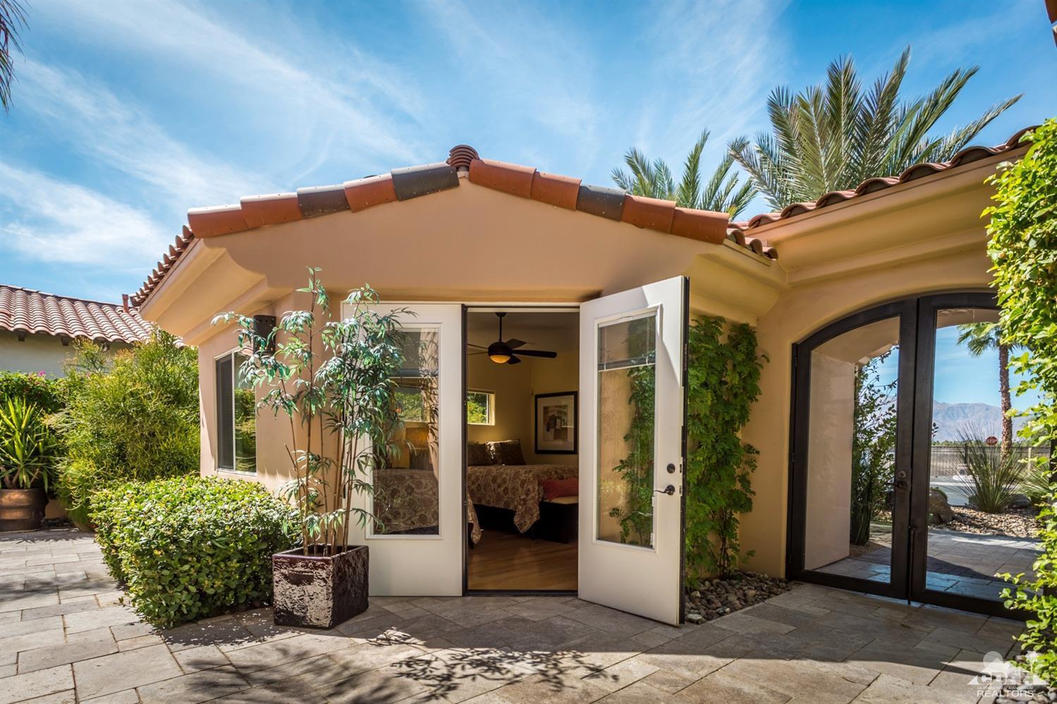 314 Loch Lomond Road Rancho Mirage, CA 92270 - Photo 30 of 48 a front view of a house with a porch