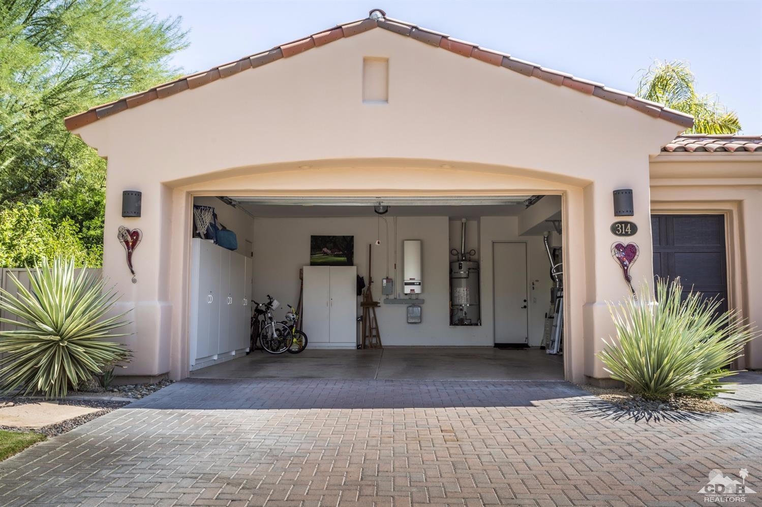 314 Loch Lomond Road Rancho Mirage, CA 92270 - Photo 39 of 48 a front view of house with yard