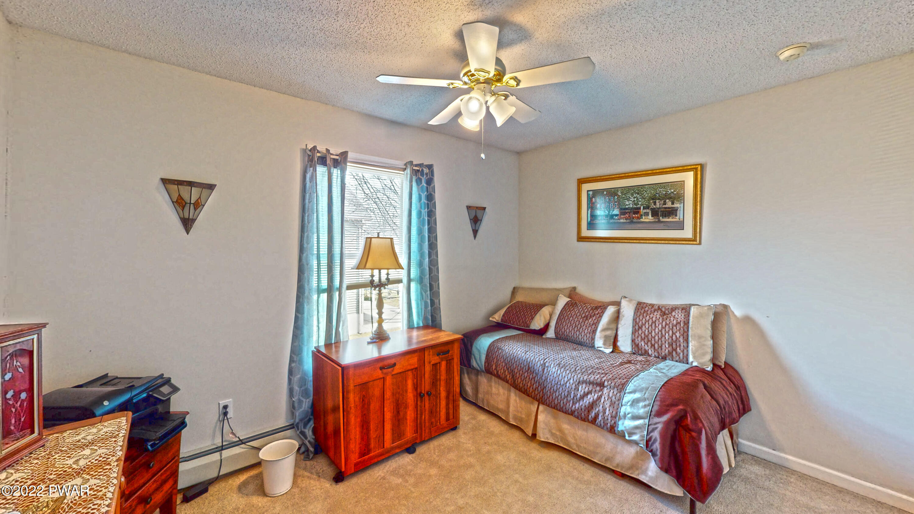 80 Boulder Road Lake Ariel, PA 18436 - Photo 28 of 59 a bedroom with a bed and a chandelier