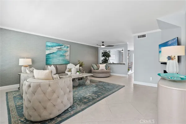 a living room with furniture and a table