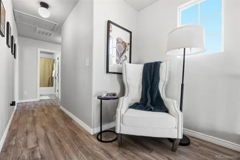 a view of cabinet with wooden floor and cabinet