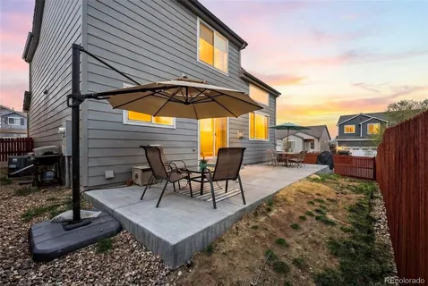 a view of a dinning tables and chairs in the patio