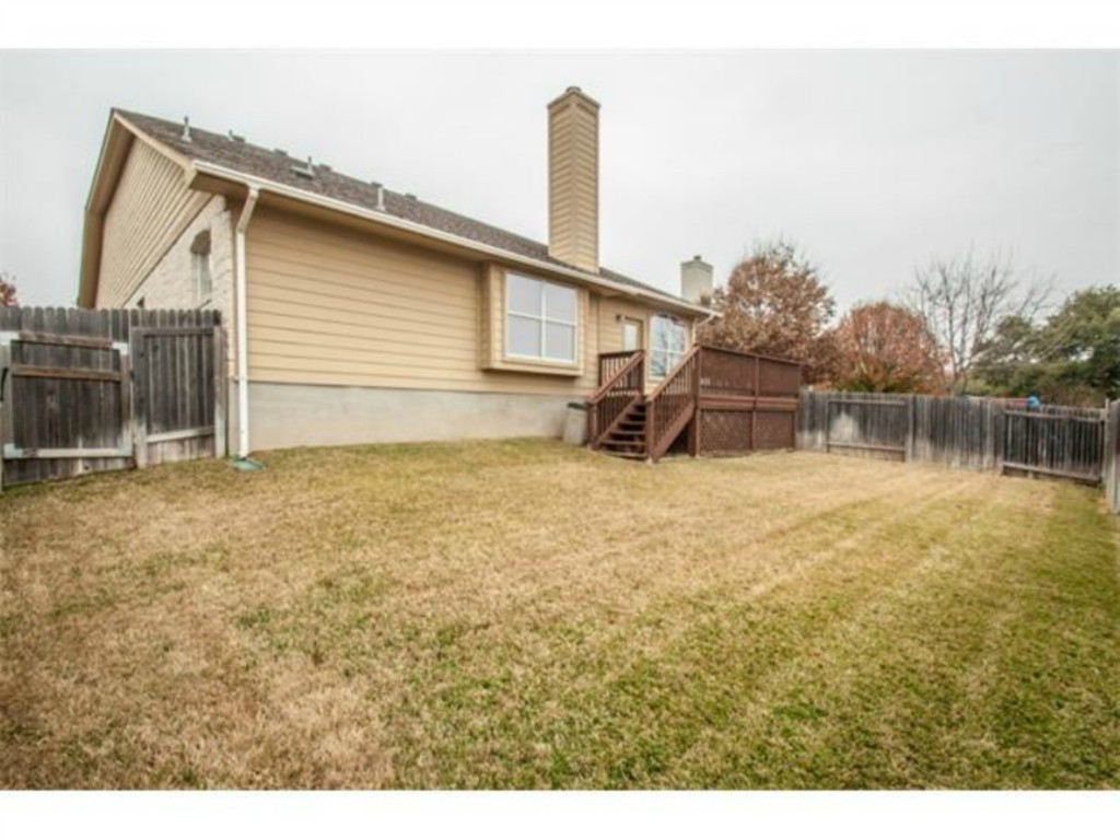 833 Rusk Road Round Rock, TX 78665 - Photo 12 of 15 a house view with a backyard space