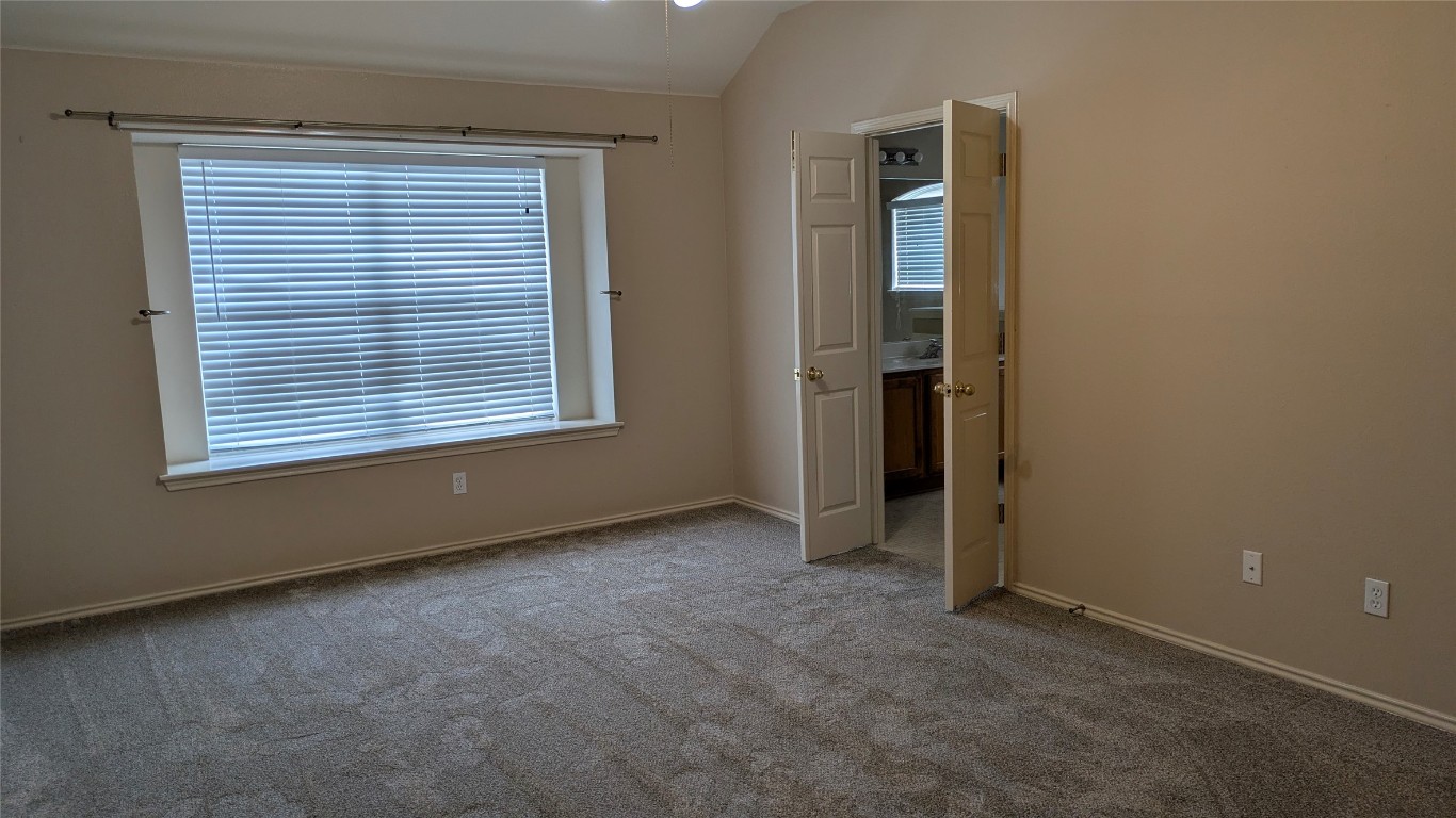 833 Rusk Road Round Rock, TX 78665 - Photo 15 of 15 an empty room with windows and closet
