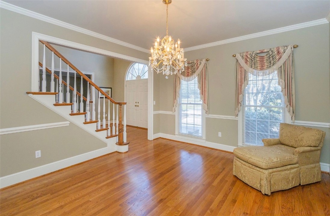 1104 Thornehill Drive Anderson, SC 29621 - Photo 15 of 35 Enter into a bright space featuring rich hardwood floors and elegant crown molding.