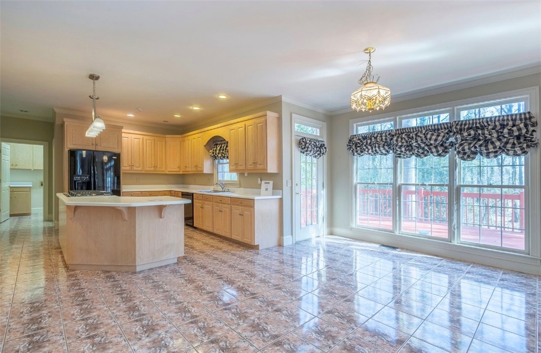 1104 Thornehill Drive Anderson, SC 29621 - Photo 18 of 35 This spacious kitchen and dining area offers ample natural light and a seamless flow to the outdoors.