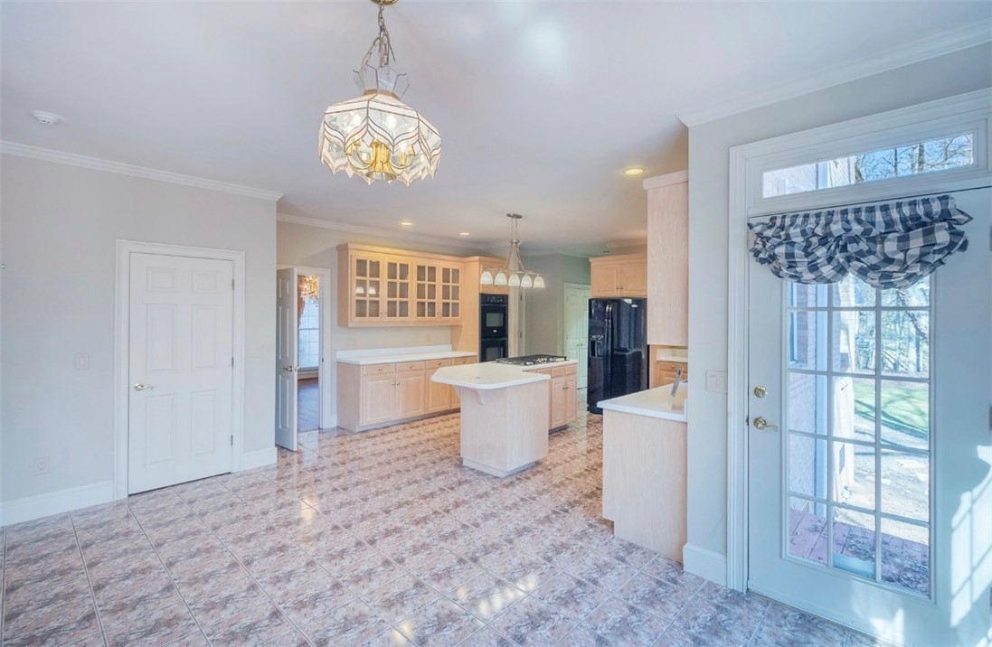 1104 Thornehill Drive Anderson, SC 29621 - Photo 19 of 35 This spacious kitchen offers abundant light and direct access to outdoor living.