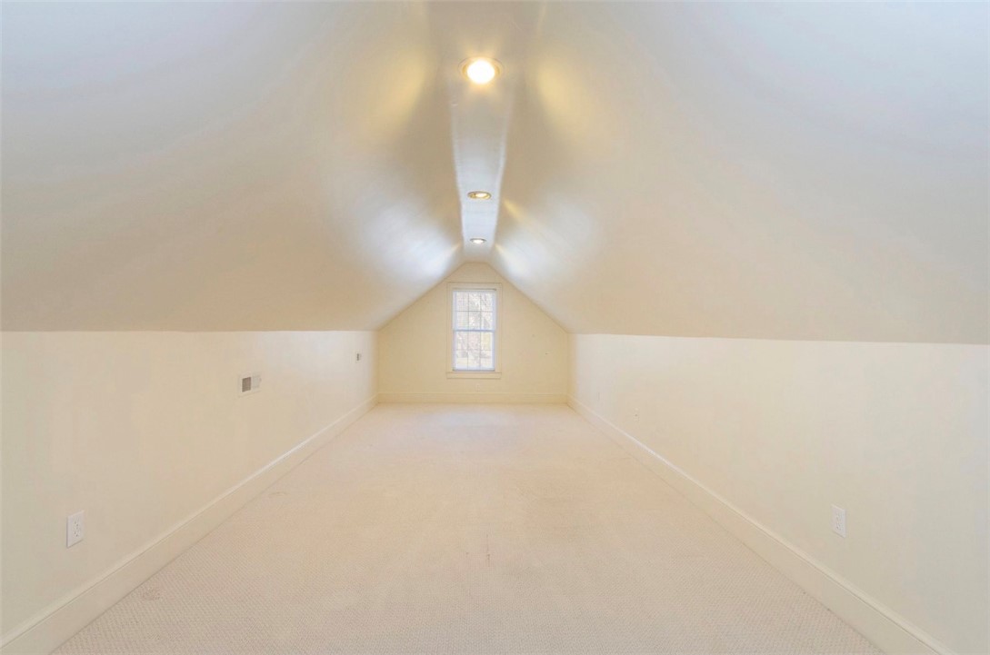 1104 Thornehill Drive Anderson, SC 29621 - Photo 27 of 35 This spacious attic room offers abundant light and versatile space.