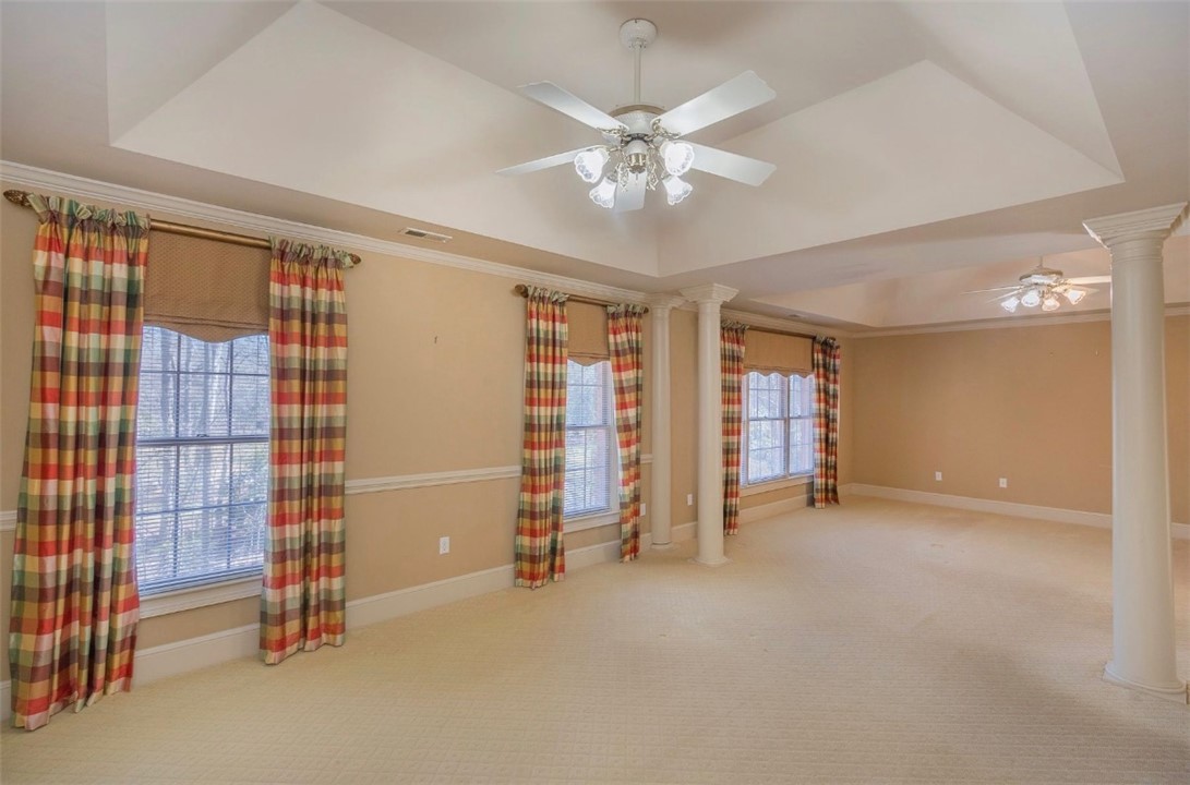 1104 Thornehill Drive Anderson, SC 29621 - Photo 28 of 35 This spacious area features elegant columns, bright windows, and detailed crown molding.
