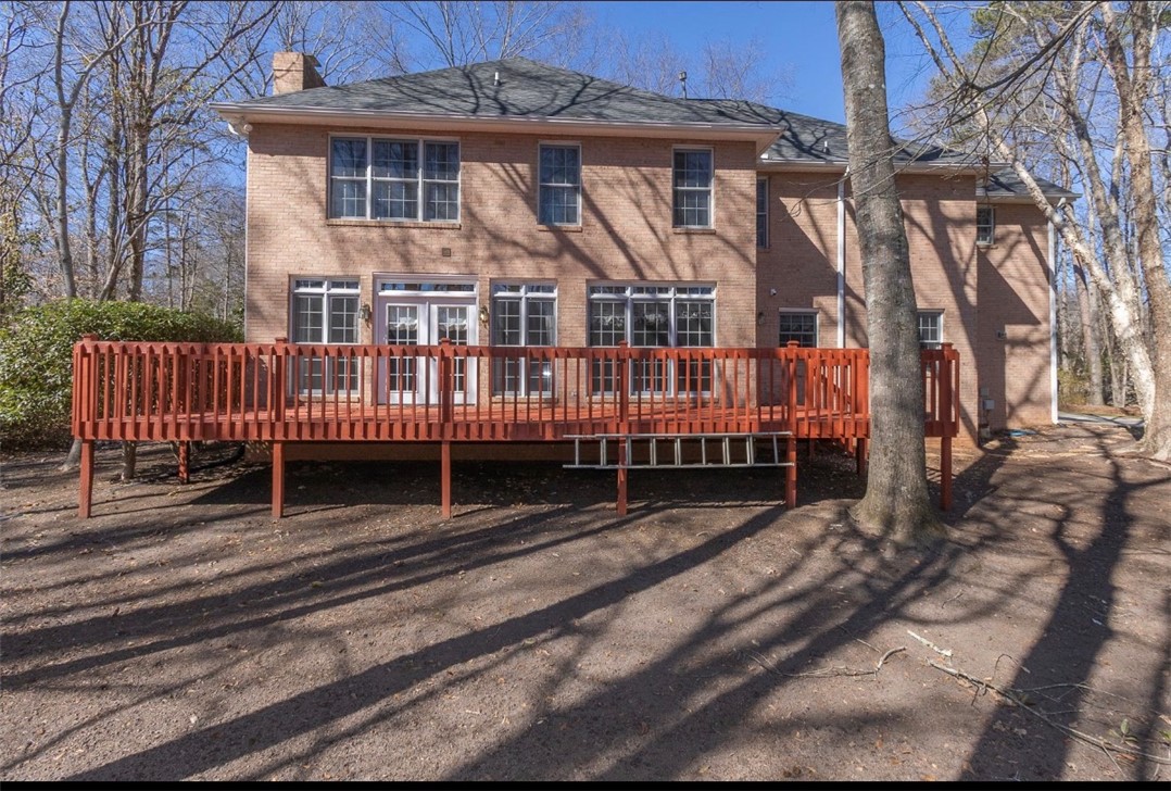 1104 Thornehill Drive Anderson, SC 29621 - Photo 8 of 35 This brick home offers a large deck for outdoor enjoyment and entertaining.
