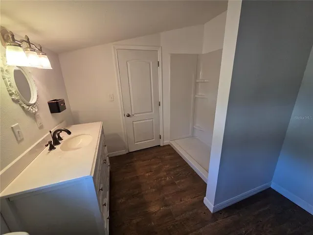 a bathroom with a sink and tub