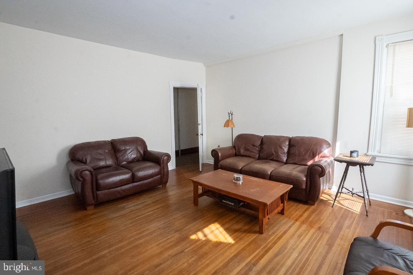 349 Reading Boyertown, PA 19512 - Photo 11 of 24 a living room with furniture and a wooden floor