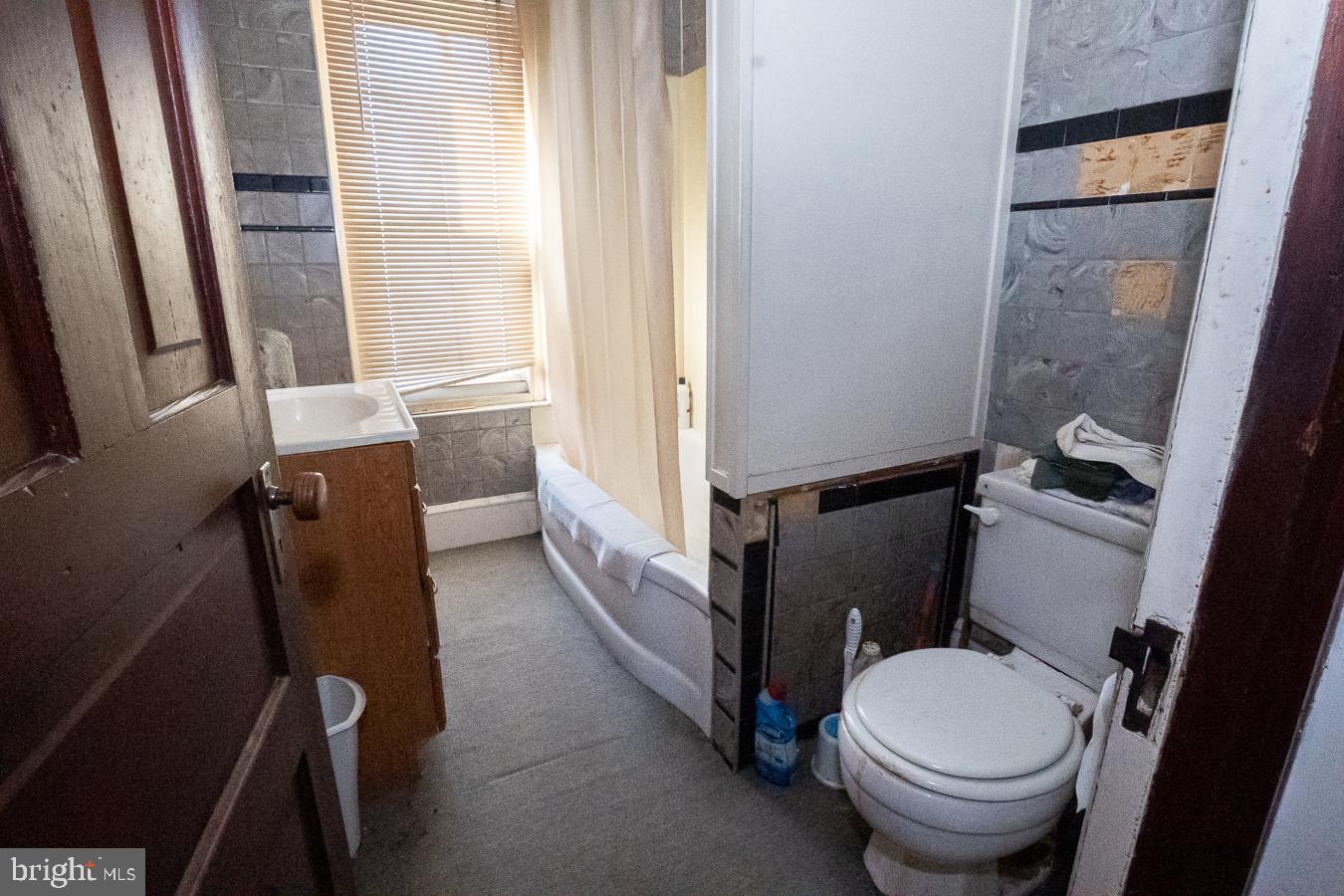 349 Reading Boyertown, PA 19512 - Photo 19 of 24 a bathroom with a sink and a toilet
