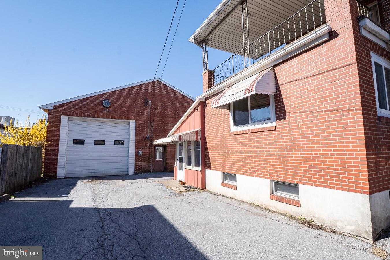 349 Reading Boyertown, PA 19512 - Photo 4 of 24 a front view of a house with a garage