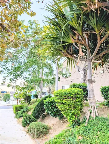 a view of swimming pool with a table and chair