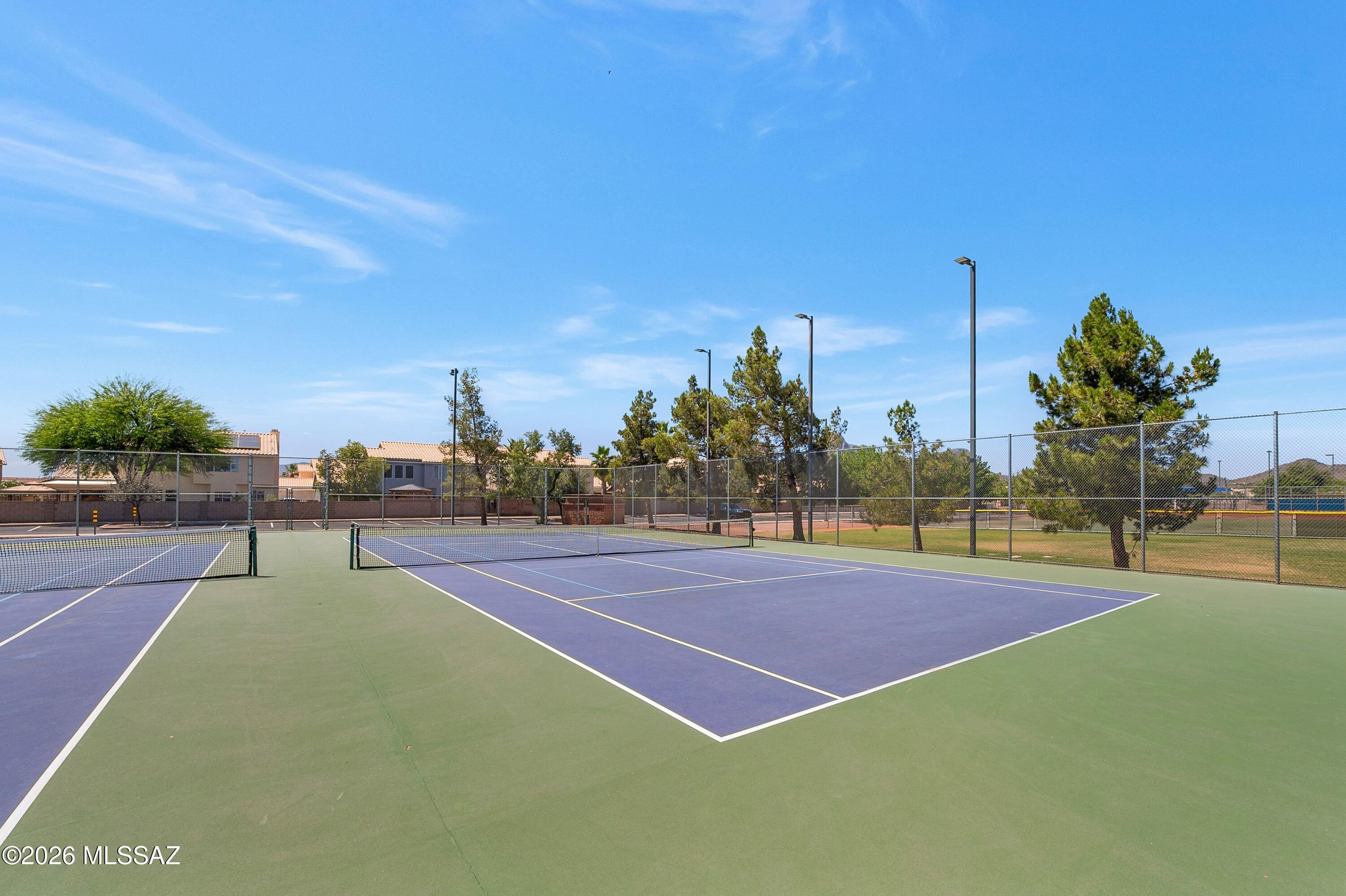 7159 West Maple Ridge Drive Tucson, AZ 85743 - Photo 42 of 42 a view of a tennis court