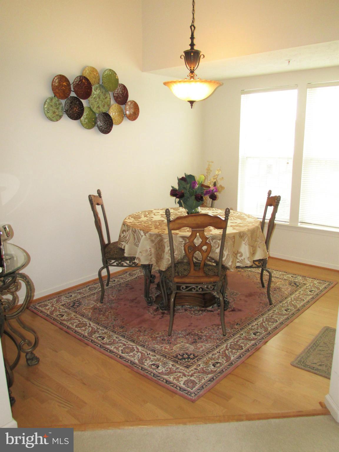 5498 Glenthorne Court, Unit 5498 Rosedale, MD 21237 - Photo 11 of 28 Dining Room