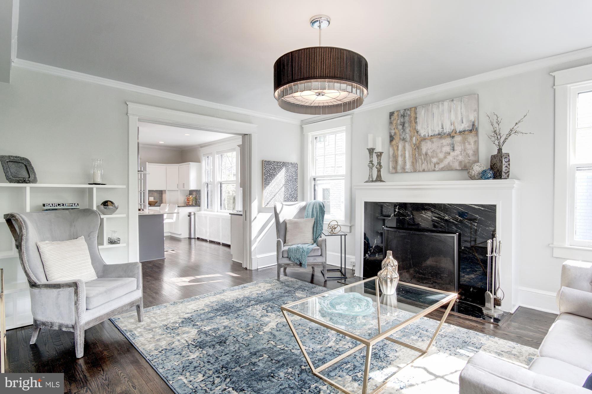 3309 Woodley Road Northwest Washington, DC 20008 - Photo 7 of 59 Beautiful lighting & wood burning fireplace