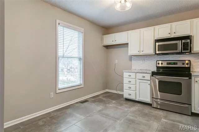 $330,000 | 5229 Woosencraft Drive, Wentzville, MO 63385