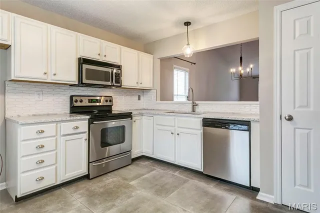 $330,000 | 5229 Woosencraft Drive, Wentzville, MO 63385