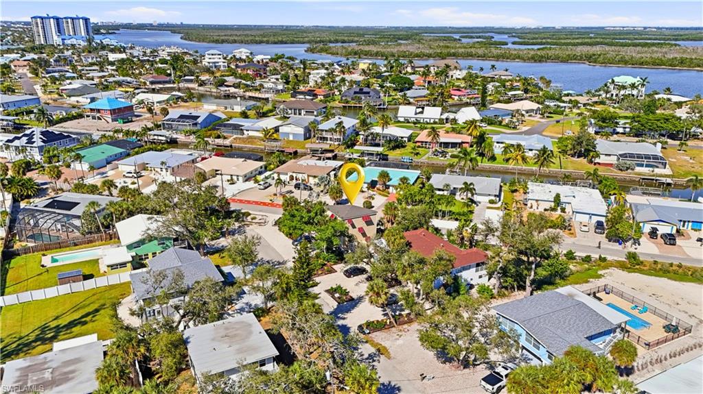 5431 Oak Ridge Avenue Fort Myers Beach, FL 33931 - Photo 32 of 33 an aerial view of residential building with outdoor space