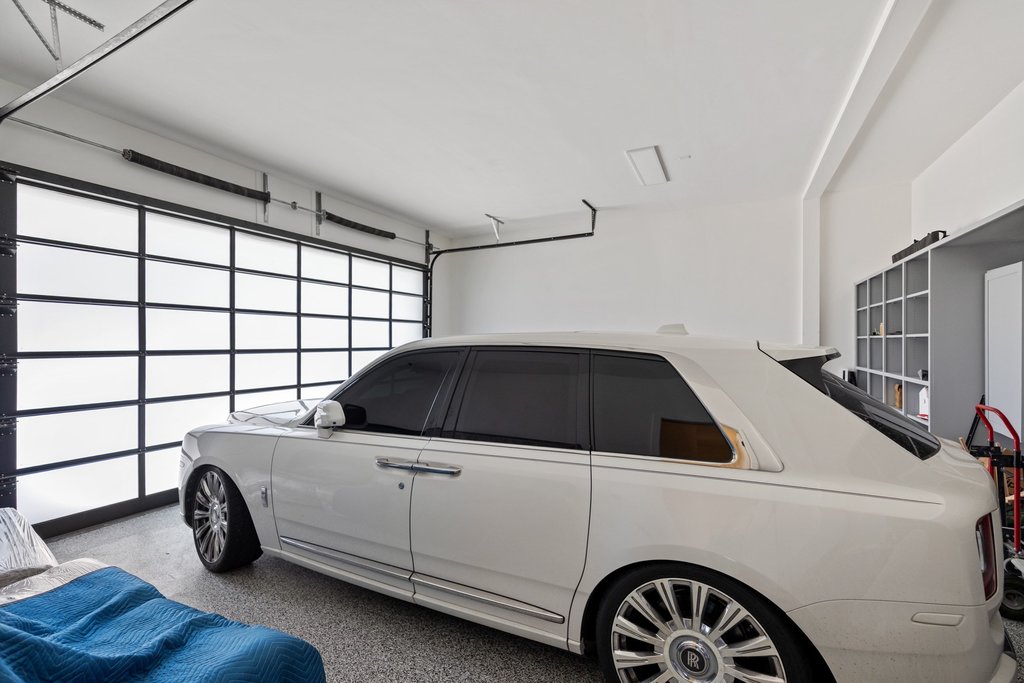 7117 Davenport Divide Road Austin, TX 78738 - Photo 35 of 40 Secure parking within a meticulously maintained garage, offering ample space and pristine flooring.
