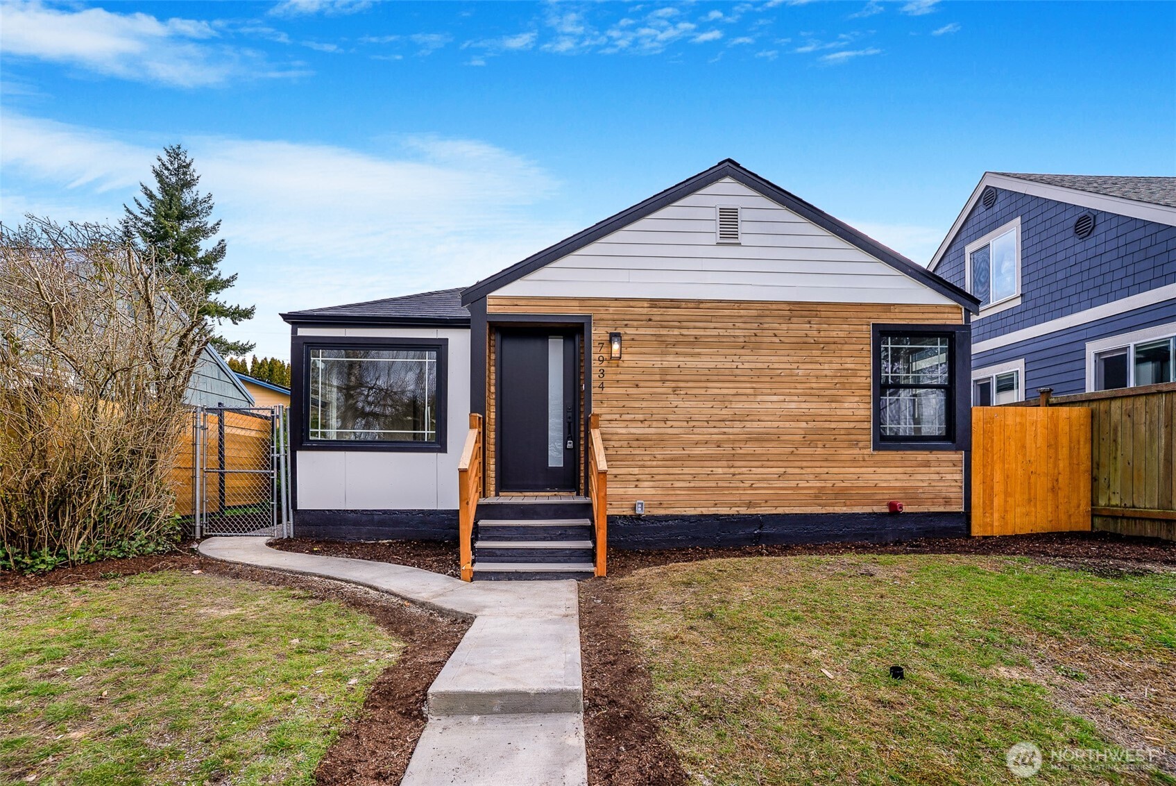 7934 20th Avenue Southwest Seattle, WA 98106 - Photo 2 of 20 a view of front of house with swimming pool